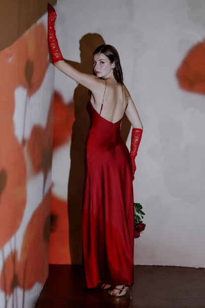 Red satin halter maxi dress with gold chain straps