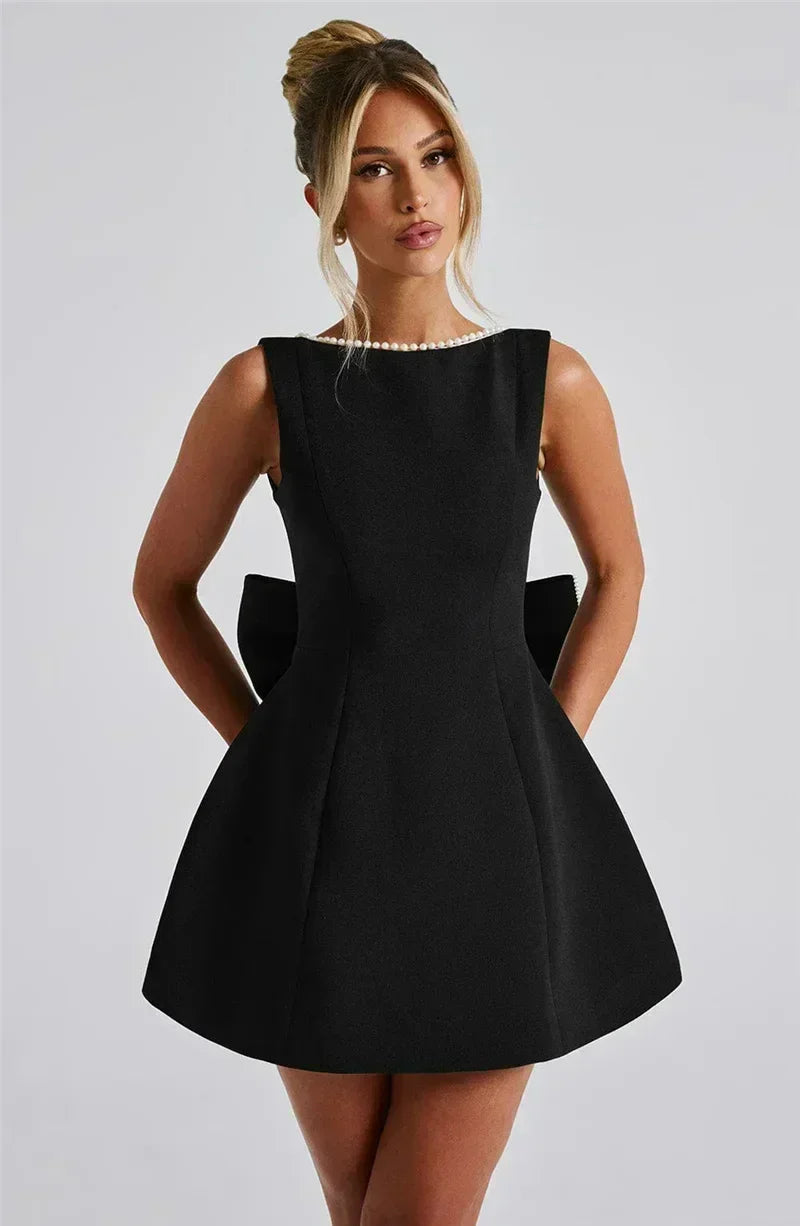 Mozision Pearl Bow Backless Sexy Mini Dress For Women Robe Fashion Zipper Sleeveless High Waist A-line Club Party Dress Elegant