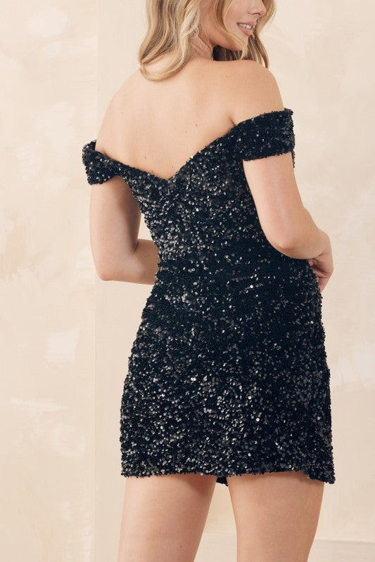 Back view of off-shoulder sequin short dress with mid-back design
